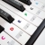 Kolorowe naklejki z nutami na klawisze keyboardu